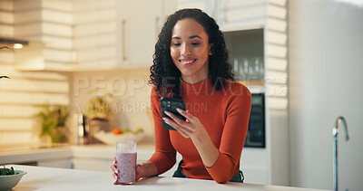 Buy stock photo Happy woman, phone or diet with smoothie in kitchen for health tips, nutrition or app in home. Female person, nutritionist or user with smile on mobile smartphone for online recipe or drink in house