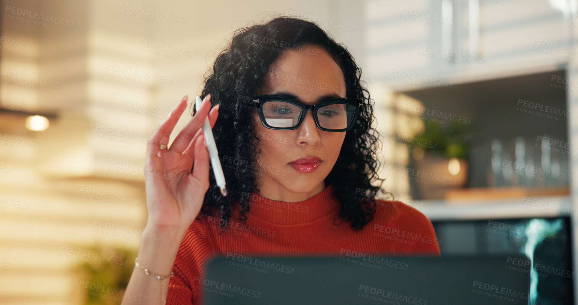 Buy stock photo Laptop, pen and remote work with woman in kitchen of home for small business or startup planning. Computer, glasses and reading with freelance employee in apartment for online research or review