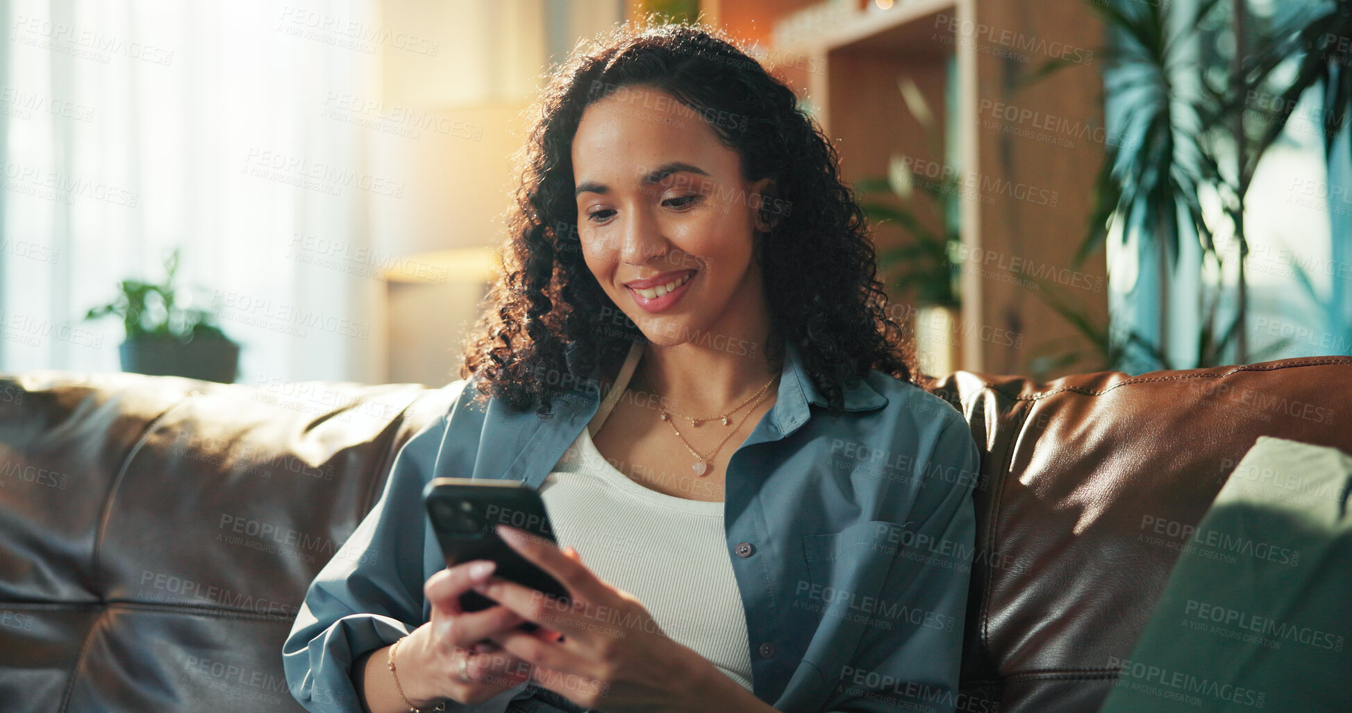 Buy stock photo Typing, phone and search with woman on sofa for social media, communication and networking app. Mobile, news update and chat forum with person in home for text message, connection and contact