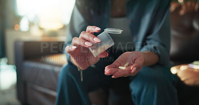 Buy stock photo Hands, home and woman on sofa, pills and container with medical treatment, illness and dosage. Closeup, apartment and person with prescription, tablets and chronic patient with pharmaceutical care