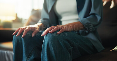 Buy stock photo Anxiety, waiting and hands of woman on sofa for stress, pressure and mental health. Doubt, depression and overwhelmed with legs of person in living room of home for panic attack and psychology