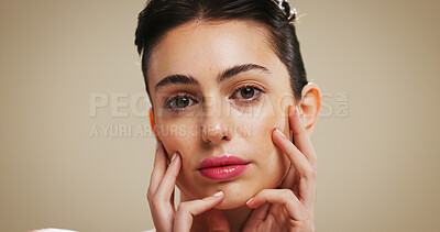 Buy stock photo Portrait, skincare and woman in studio for beauty, aesthetic and makeup with glow. Face, serious and female model with lipstick for cosmetics, dermatology and facial treatment on brown background