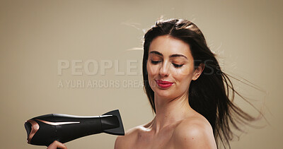 Buy stock photo Beauty, hair care and girl with hairdryer on studio background for styling, drying and heat. Mockup space, woman or cosmetics appliance for keratin treatment, selfcare routine or growth maintenance