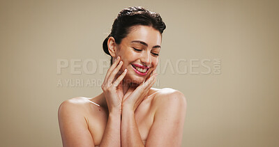 Buy stock photo Thinking, woman and skincare for beauty in studio for natural glow, facial treatment and dermatology. Happy, female person and ideas for healthy skin, collagen results and texture on brown background