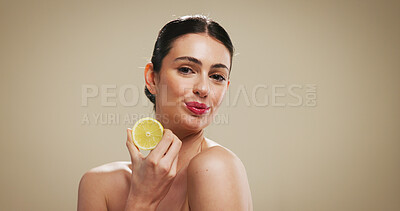Buy stock photo Lemon, skincare and beauty with portrait of woman in studio for organic cosmetics, vitamin c benefits or glow. Natural product, self care and antioxidant with person on background for fruit and space