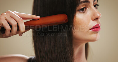 Buy stock photo Hair, brush and shine with woman in studio for salon maintenance, volume and texture. Keratin treatment, self care and scalp stimulation for growth with person on brown background for glow and beauty
