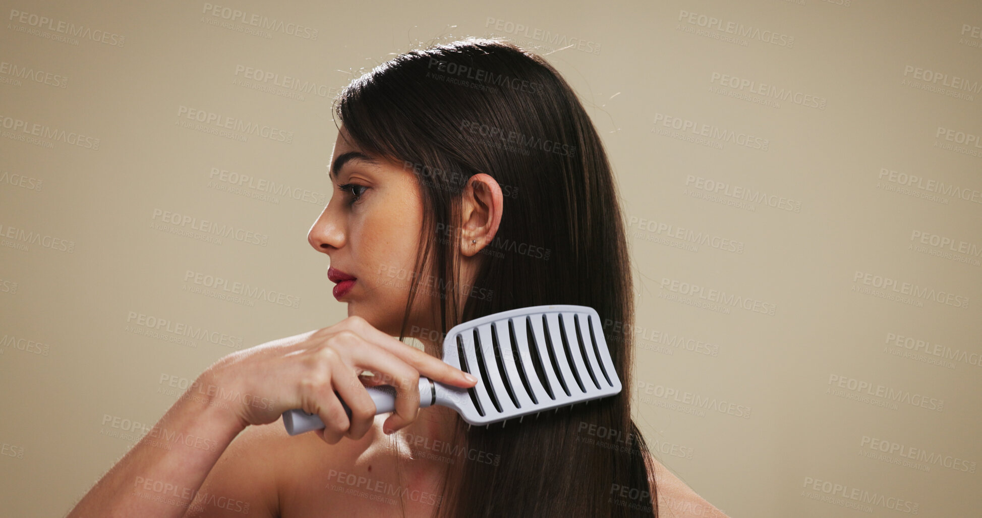 Buy stock photo Hair, brush and growth with woman in studio for salon maintenance, volume and texture. Keratin treatment, self care and scalp stimulation for beauty with person on background for shine and space