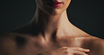 Shoulder, glow and skincare with woman in studio for dermatology, body care and hygiene. Collagen benefits, aesthetic and shine with closeup of person on black background for grooming and neck
