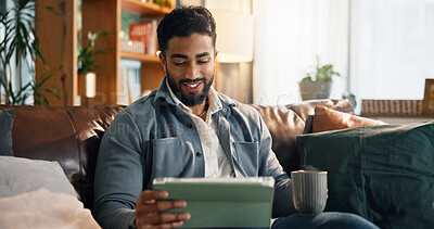 Buy stock photo Happy man, tablet or watching with coffee on sofa for online entertainment or subscription in home. Male person, smile and streaming with technology for movie app, network or connection in house