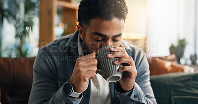 Buy stock photo Coffee, happy and man on sofa in home with calm, peace or morning break with warm beverage. Smile, relax and person drinking cappuccino for wellness, chilling or comfort in living room at apartment.