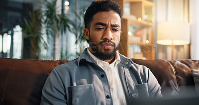 Buy stock photo Freelancer, online and thinking with man on sofa for article research, blog writer and reflection. Journalist planning, remote worker and draft editing with person in living room of home for idea