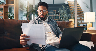 Buy stock photo Stress, document and man with bills in home for debt, rent and mortgage cost with laptop. Banking, expenses and person with paper in living room for financial crisis, taxes and bankruptcy with loan