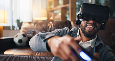 Buy stock photo Man, VR headset and video game in home with controller, play and metaverse user experience in lounge. Person, augmented reality and happy for virtual soccer contest, esports or competition at house