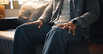 Hands, nervous and therapy with person on sofa in office for consulting or counseling appointment. Anxiety, mental health or stress with trauma patient in session for advice, healing or psychology