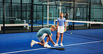 Padel, sports and children tie shoes on court for workout, exercise and training together. Fitness club, siblings and boy help girl with sneakers for playing game, match and tournament for practice
