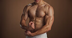 Arms, body and flex with shirtless man in studio for exercise, fitness or training results. Health, power and strength with muscular person isolated on space for bodybuilding, confidence or workout