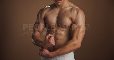 Buy stock photo Arms, body and flex with shirtless man in studio for exercise, fitness or training results. Health, power and strength with muscular person isolated on space for bodybuilding, confidence or workout