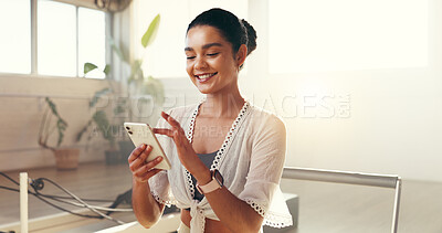 Buy stock photo Woman, smartphone and scroll at pilates studio with smile for exercise update, social media and texting. Female person, fitness and mobile app for health progress with chat or reading blog at club