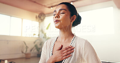 Buy stock photo Yoga, meditation and breathing with woman, heart health and calm with wellness, zen and mindfulness. Apartment, fitness or person in studio, workout and gratitude with break, stress relief or balance