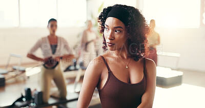 Buy stock photo Fitness, pilates class and woman for wellness, gym and workout with balance on reformer. Health, hobby and female person on machine for core strength, exercise or training activity in yoga studio.