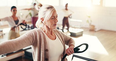 Buy stock photo Fitness, personal trainer and pilates with women in class together for development or improvement. Exercise, health or wellness with mature coach and people in studio for training or workout