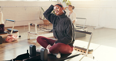 Buy stock photo Woman, stretching and neck with exercise in gym for workout preparation in fitness center. Female person, warm up or flexibility with muscle relief for group pilates class or wellness in health club