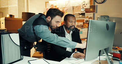 Buy stock photo Computer, night and pointing with detective people in office together for crime investigation. Evidence, police work and research with partner men at workplace desk for evening collaboration on case