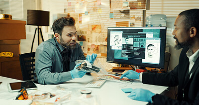 Buy stock photo Computer screen, collaboration and plastic bag with detective people in office at night. Conversation, evidence and investigation with police team at desk in workplace for evening review of clues