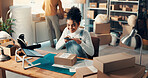Box, phone and supply chain with woman in distribution office for inventory or parcel tracking. Barcode scanning, logistics and photograph with employee at desk for delivery, ecommerce or shipping