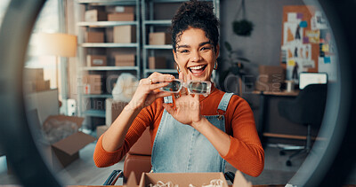 Buy stock photo Logistics, portrait and sunglasses with woman in office for advertising or product review. Boxes, ring light and supply chain with pov of employee at desk for delivery, ecommerce or shipping