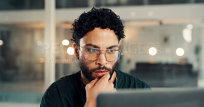 Buy stock photo Laptop, thinking and web design with man in office at night for problem solving or solution. Business, coding and computer with programmer at bokeh for evening maintenance or troubleshooting