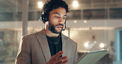 Buy stock photo Headset, tablet and video call with business man in office at night for project management update. App, communication and virtual meeting with employee at workplace for online discussion in evening