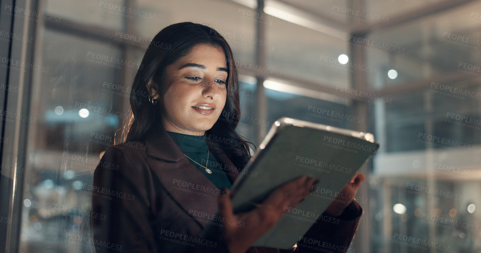 Buy stock photo Business woman, night and tablet in office for insurance, policy review or research. Technology, happy broker and online in workplace for reading email with claims, update and bokeh on overtime