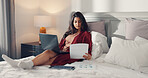 Woman, bed and reading documents with laptop for online report, analysis or financial planning. Female person, freelancer or remote work with paperwork in bedroom for finance review or budget in home