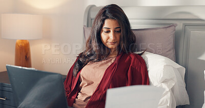 Buy stock photo Reading, document and woman with laptop, bedroom and financial analyst with project and remote work. Review, performance report and freelancer on bed with paperwork, bookkeeper and person in house
