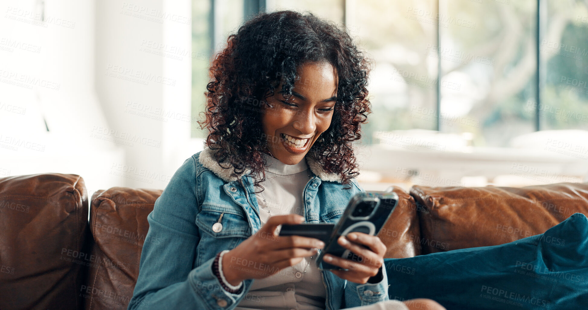 Buy stock photo Credit card, phone and typing with woman on sofa for online shopping, ecommerce and sales discount. Digital payment, banking app and customer or person in living room of home for fintech and purchase