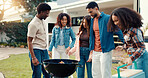 Circle, people and grill for bbq outdoor to start fire, new years party and social gathering. Group, friends and help barbecue for lunch reunion, setup flame and bonding activity in backyard at house