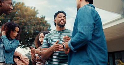 Buy stock photo Friends, backyard and people at party for conversation, relaxing and bonding for fun on weekend. Happy, outdoor and men with women talking in garden for celebration, social gathering and reunion