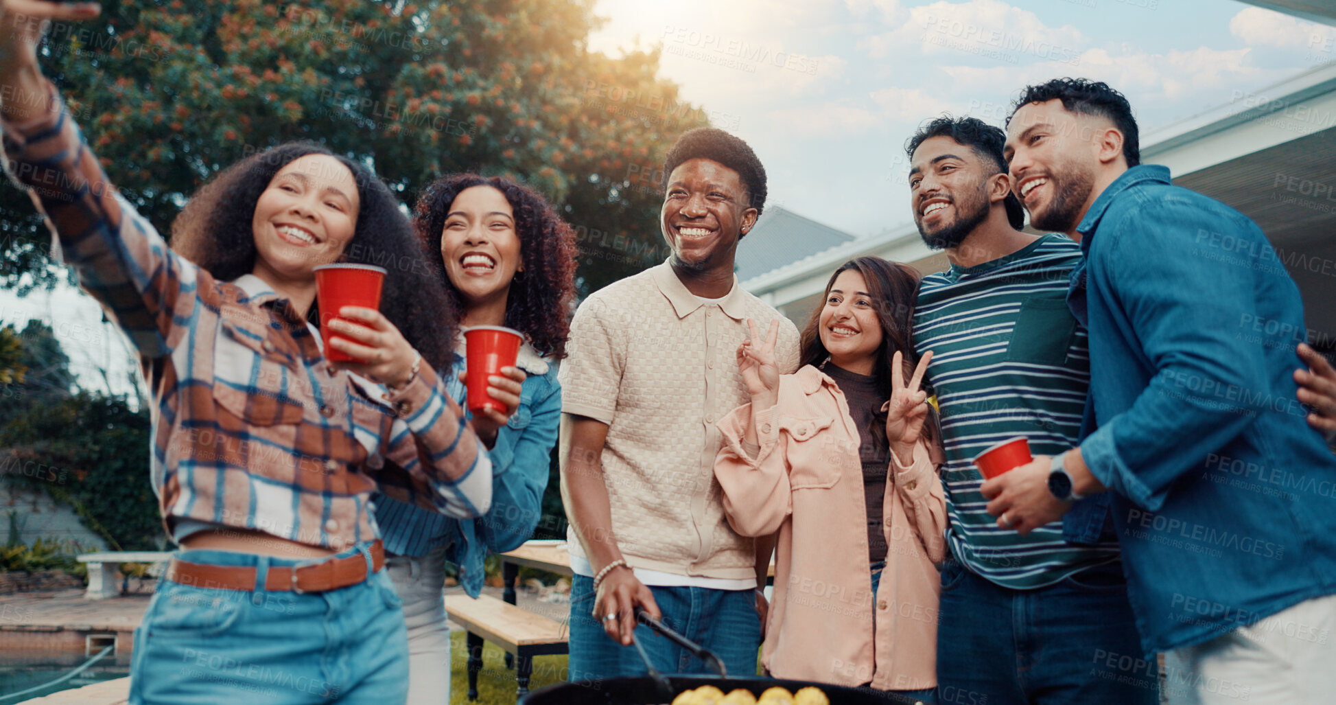 Buy stock photo Barbecue, people and selfie of friends at party, grill corn or peace sign to celebrate new year. Picture, food and happy group at bbq, laugh and hug for social media post at backyard with drinks