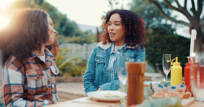 Buy stock photo Friends, women and discussion with lunch outdoor for conversation, bonding and social gathering. Thanksgiving celebration, people and happy together with eating for holiday reunion and weekend break
