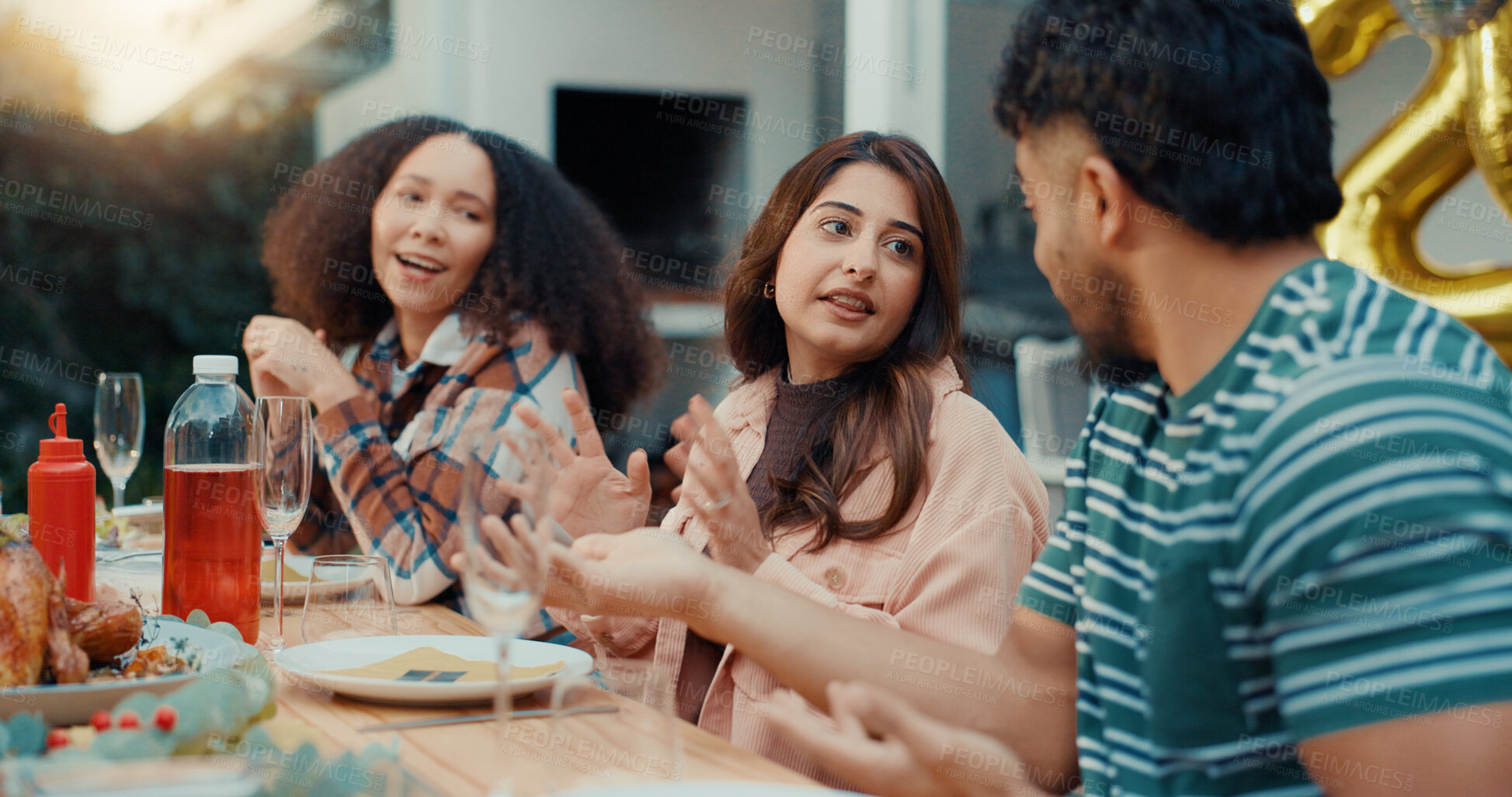 Buy stock photo Friends, event and discussion with lunch outdoor for conversation, bonding and social gathering. Thanksgiving celebration, people and happy together with eating for holiday reunion and weekend break