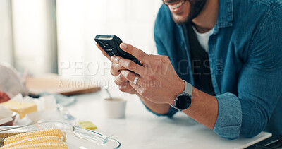 Buy stock photo Phone, food and hands of man in kitchen for cooking with online recipe on mobile app in apartment. Happy, cellphone and person with ingredients for dinner, meal or supper with instructions in home.