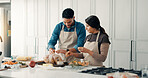Cooking, chicken and couple in kitchen in home for bonding, connection or preparing meal together. Love, ingredients and man with woman for healthy, wellness or diet dinner for nutrition in apartment