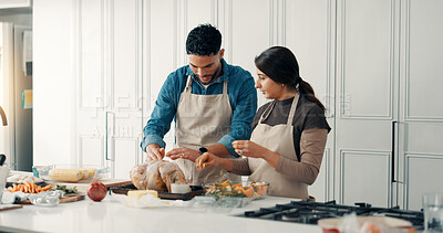 Buy stock photo Cooking, chicken and couple in kitchen in home for bonding, connection or preparing meal together. Love, ingredients and man with woman for healthy, wellness or diet dinner for nutrition in apartment