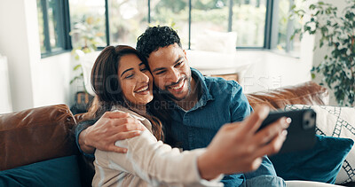 Buy stock photo Selfie, smile and couple on sofa, love and bonding together with happiness, memory and relationship. Home, profile picture and man on couch, woman or relax with marriage, romance or online streaming