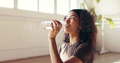 Buy stock photo Woman, fitness or drinking with water for hydration, recovery or natural beverage in gym. Female person, yogi or thirst with aqua, mineral liquid or bottle for workout break or rest in health club