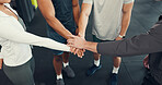 Fitness, group or hands together in support at gym for exercise challenge, success or workout goals. Team, above and people with huddle at sports club for training celebration and wellness community