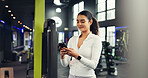 Phone, smile and woman in gym for fitness, training guide or tracking progress for health stats. Sports club, mobile and happy person check workout schedule, wellness info or online chat with app