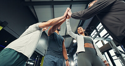 Buy stock photo Exercise, group or hands together in support at gym for training success, team building or workout. Below, people and high five celebration at sports club for wellness progress and fitness community