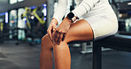 Exercise, knee injury and hands of person in gym for physical training or workout accident. Fitness, legs and strain with hurt athlete in health club for emergency, joint inflammation or pain